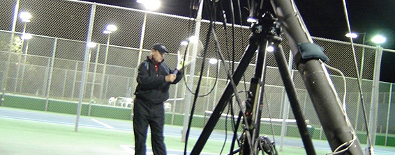outdoor tennis set at night with bill